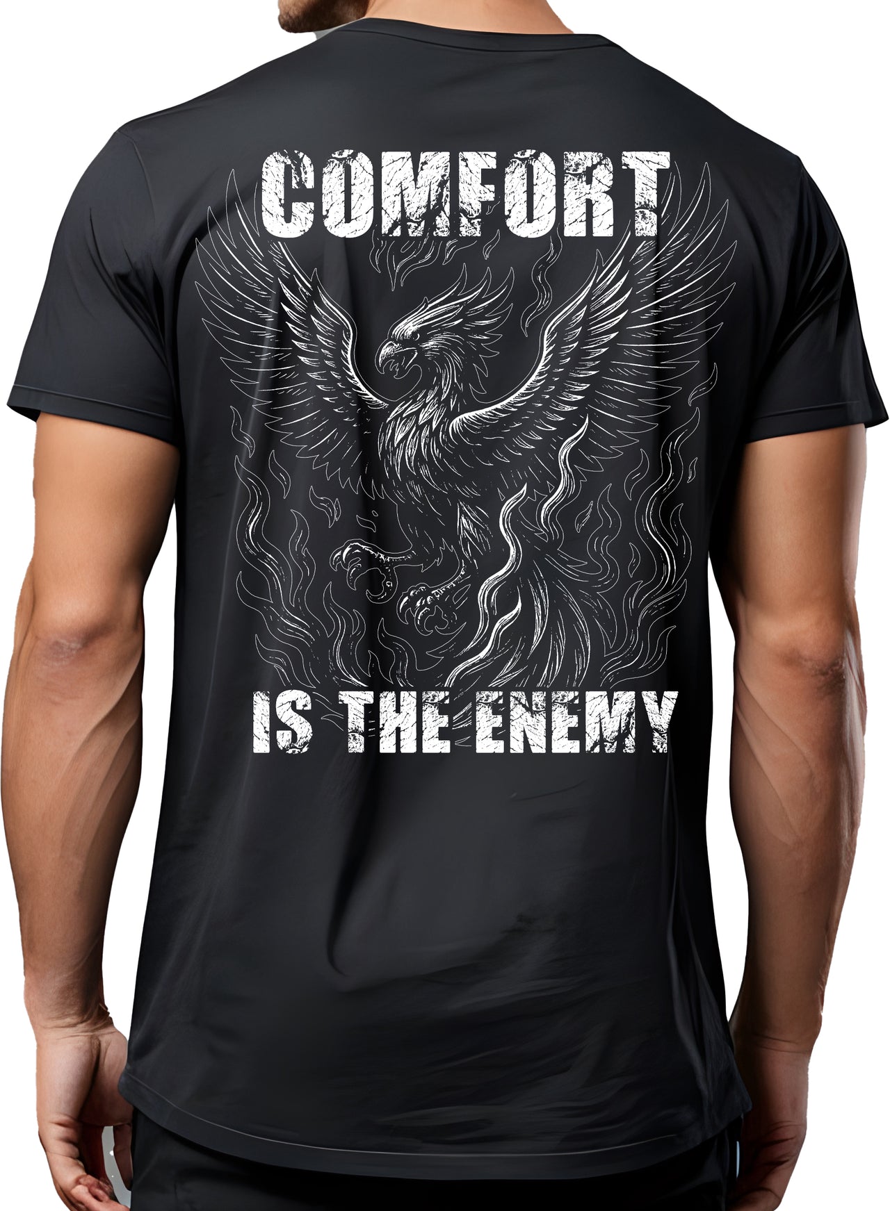 Comfort Is The Enemy Phoenix pump cover back view on model, large phoenix graphic and text on black oversized gym tee